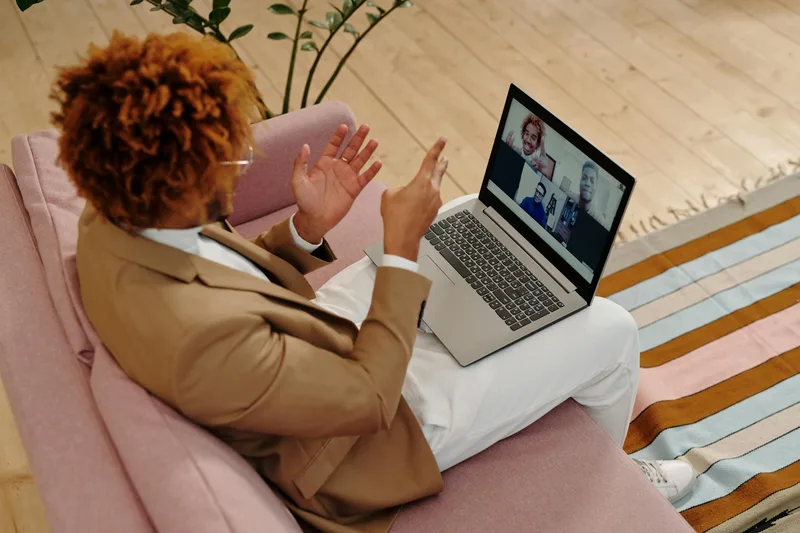 Agent and VA on video call with task list visible on screen